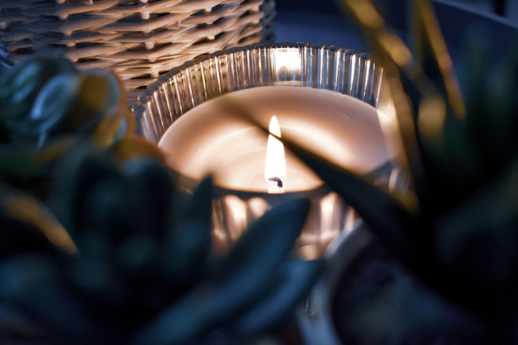 Close-up of illuminated tea light