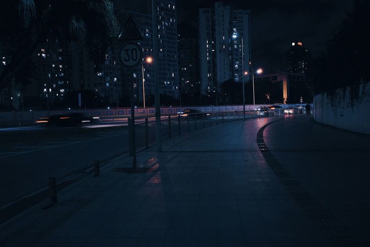 Cars on street at night