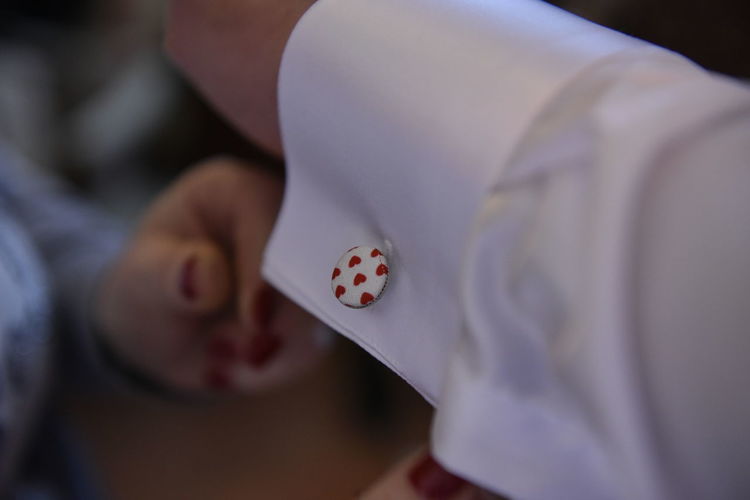 Close-up of man wearing white shirt