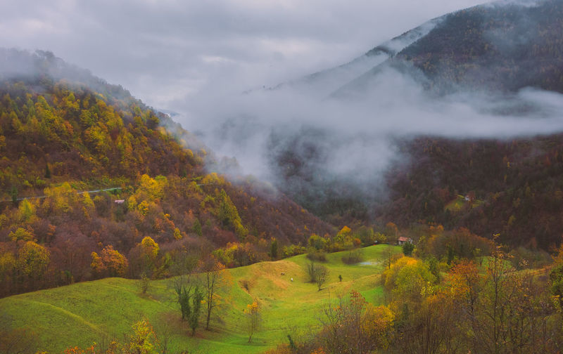 Scenic view of mountains against sky during autumn