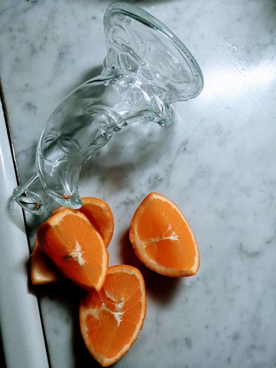 High angle view of orange on glass