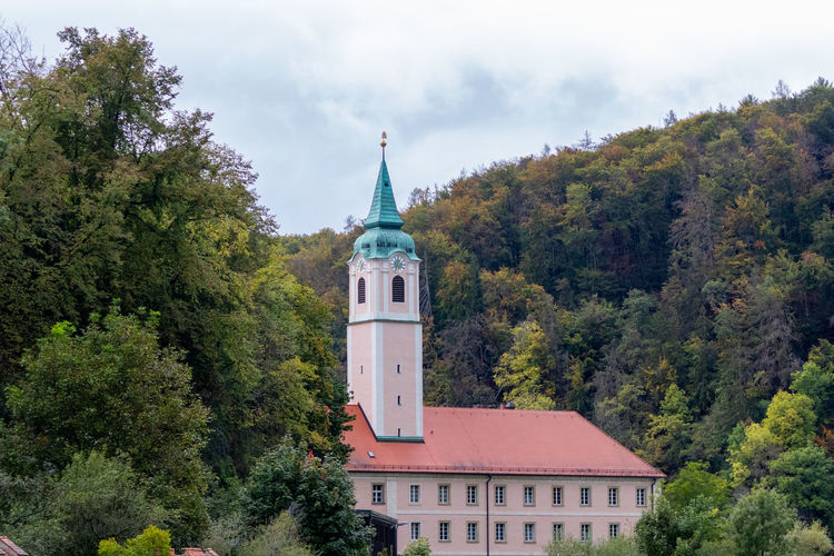 View of church and building against sky