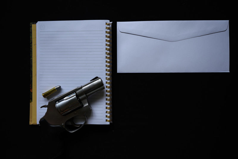 High angle view of pen on table against black background