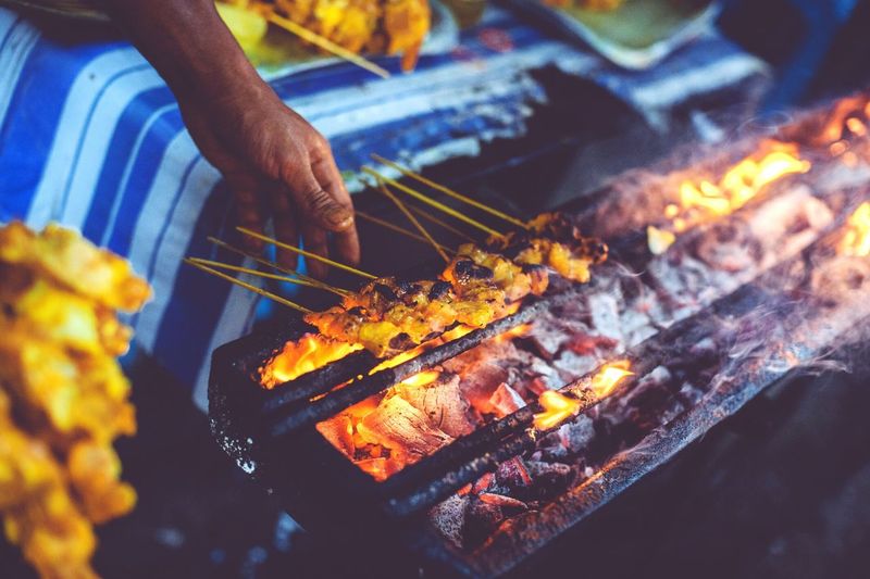 Close-up of meat on barbecue grill