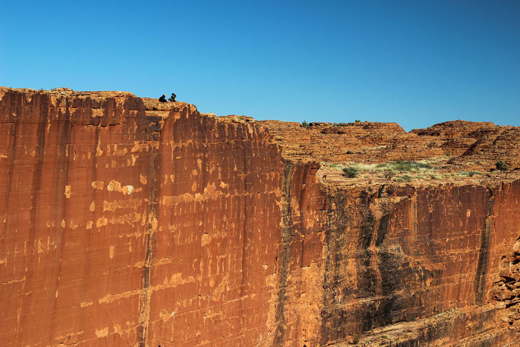 Cliff against clear blue sky