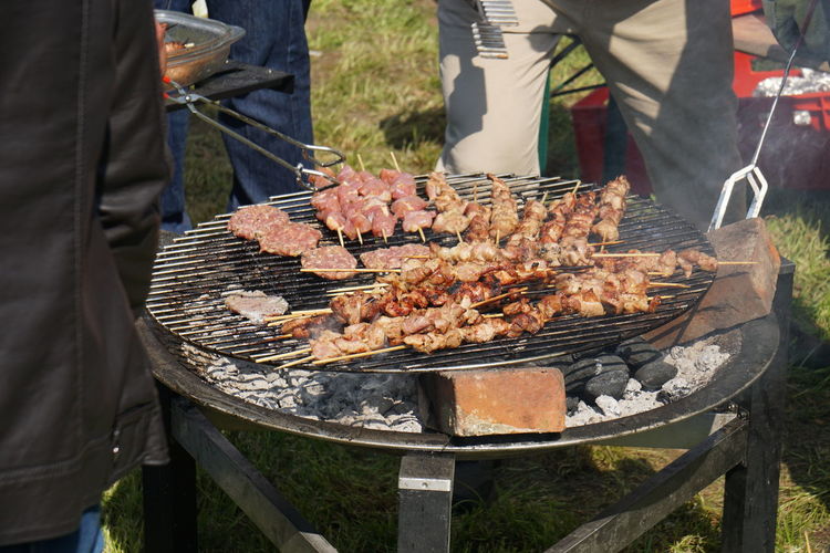 Close-up of meat on grill