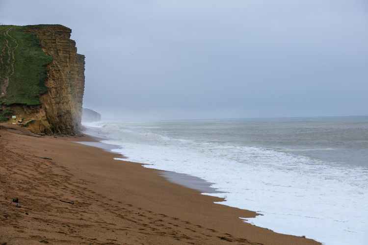Scenic view of beach against sky