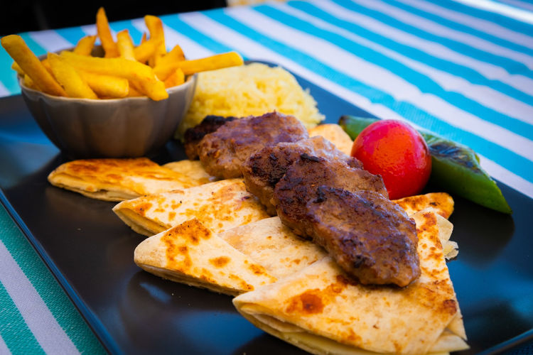 Close-up of food served on table