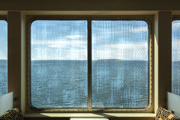 View of sea through ship window