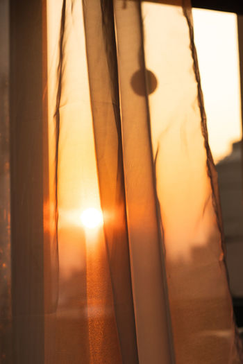 Close-up of sunlight streaming through window