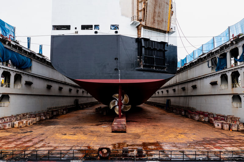 Ships in dry dock under repair and maintenance