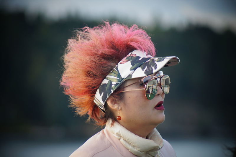 Close-up of mature woman wearing sunglasses