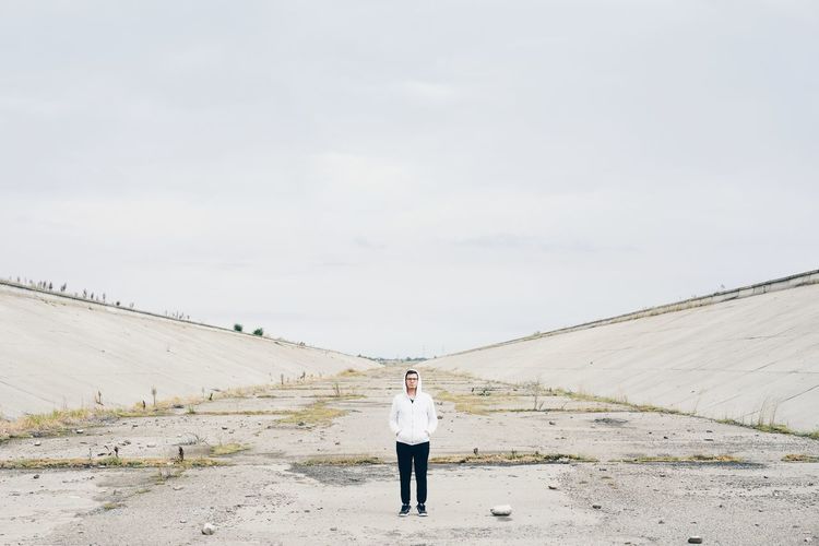 Architecture One Man Only Dam Minimalism Minimal Adults Only Desert Full Length Mid Adult Adult Solitude One Person Standing Landscape Arid Climate People Day Colour Your Horizn This Is Masculinity Go Higher Inner Power Visual Creativity #FREIHEITBERLIN The Portraitist - 2018 EyeEm Awards The Great Outdoors - 2018 EyeEm Awards The Traveler - 2018 EyeEm Awards #urbanana: The Urban Playground A New Beginning A New Perspective On Life