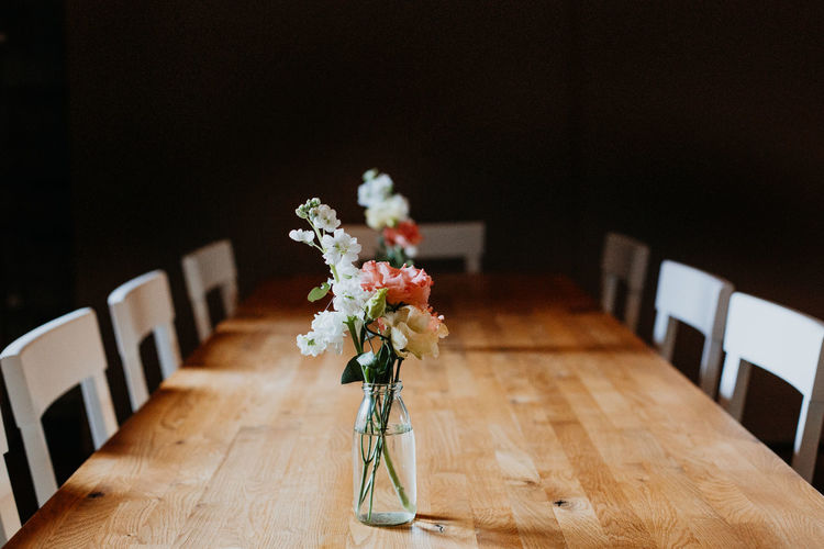 Flower vase on table