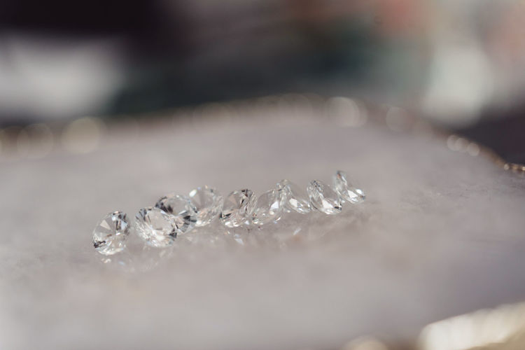 Close-up of diamonds on table