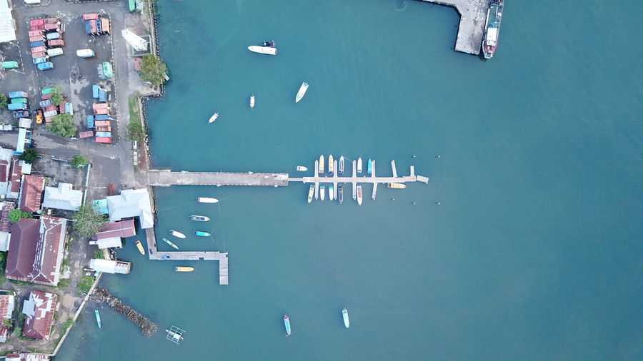 Directly above shot of boats moored at harbor in river