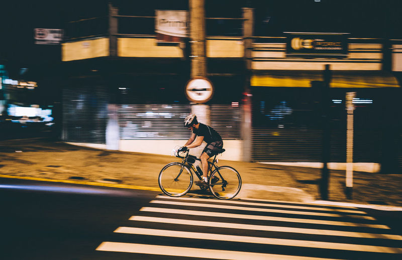 Man cycling on road