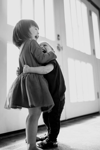 Portrait of two children hugging