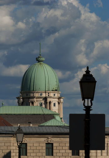 Building against cloudy sky