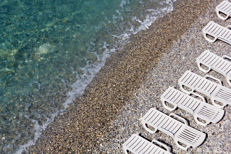 High angle view of pebbles on beach