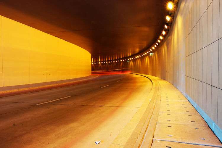 Light trails of vehicles moving in the tunnel - long exposure
