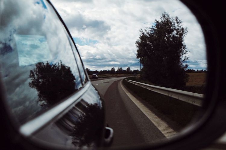 Road seen through car windshield