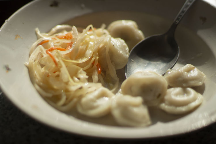 Food on plate. dumplings and cabbage. delicious lunch. natural food.