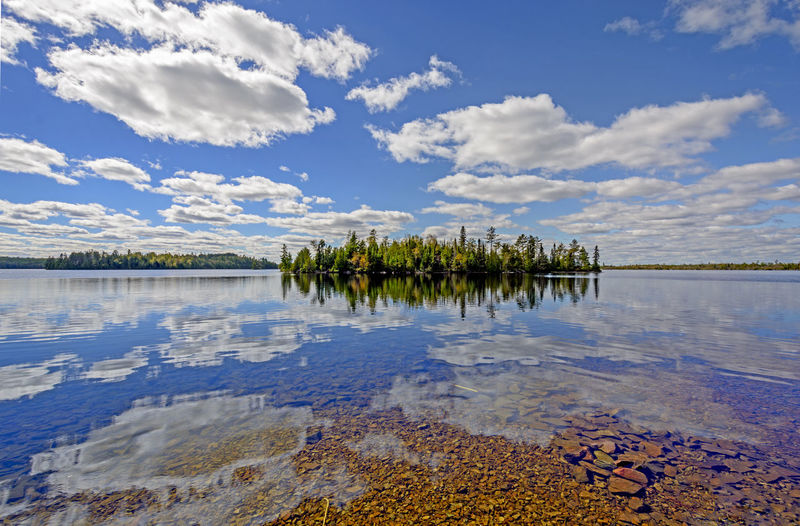 Sunny reflections on kekekabic lake in the boundary waters