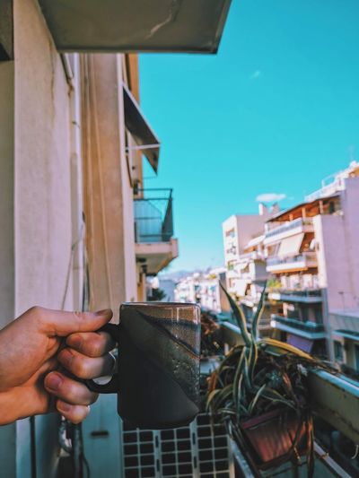 Morning coffee at balcony in pagrati, athens