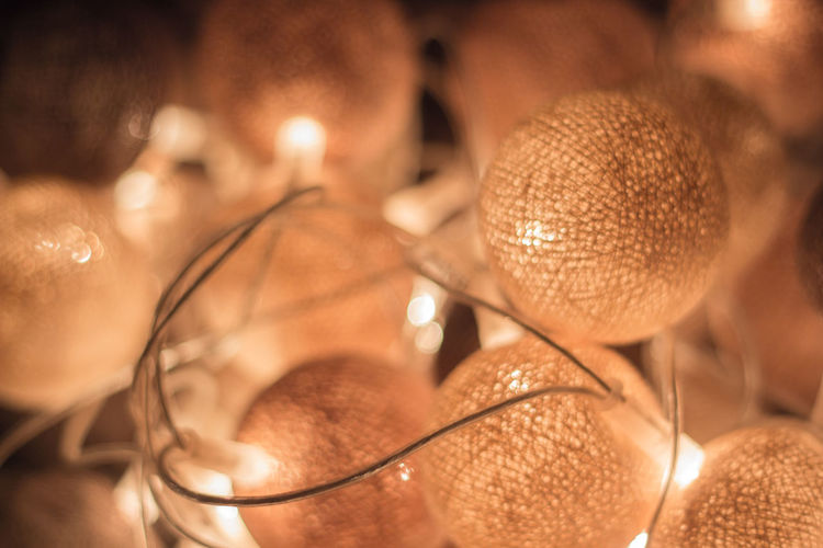Close-up of illuminated cotton ball lights