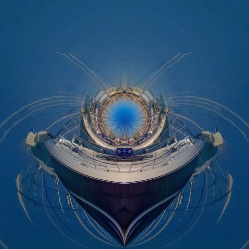 Digital composite image of sea against blue sky