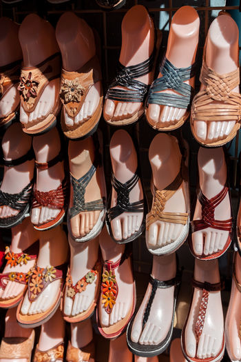 Close-up of shoes for sale at market stall