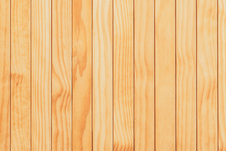Natural wooden surface made from kiln-dried boards useful as background for design and decoration. 