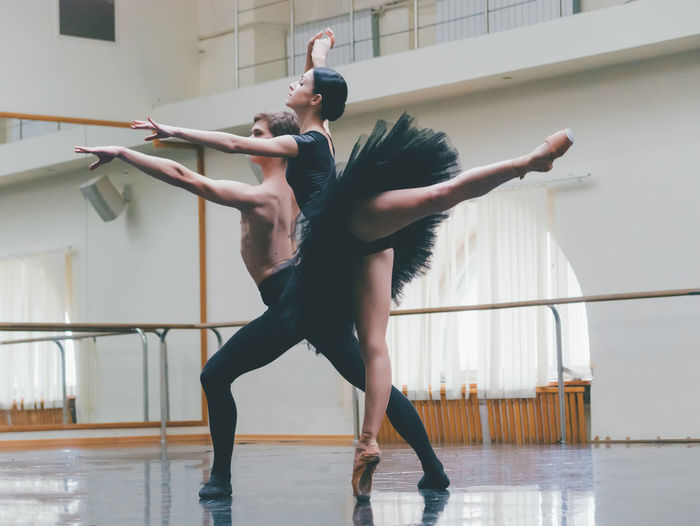 Ballet dancers dancing in studio