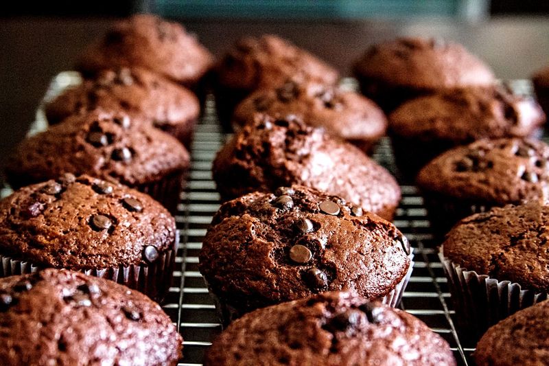 Chocolate chip muffins on baking tray