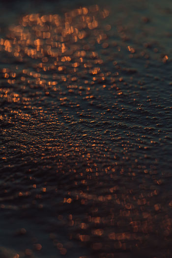 Full frame shot of sea water during sunset