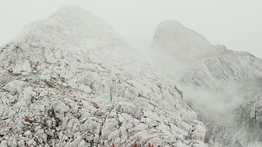 Scenice view of jade dragon snow mountain in fog