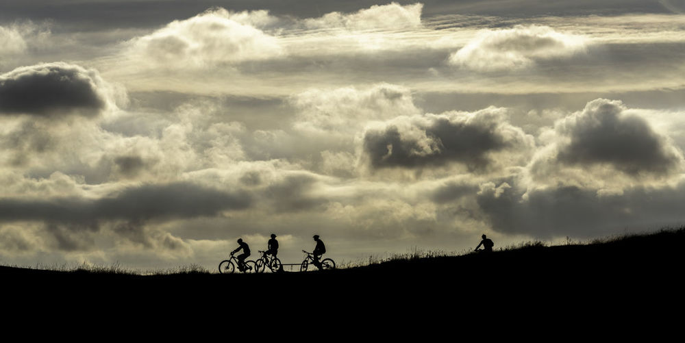 Mountain bikers on the malvern hills, malvern, uk