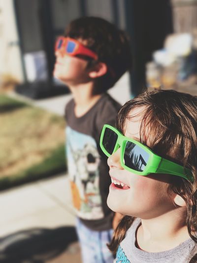 Close-up of children wearing glasses