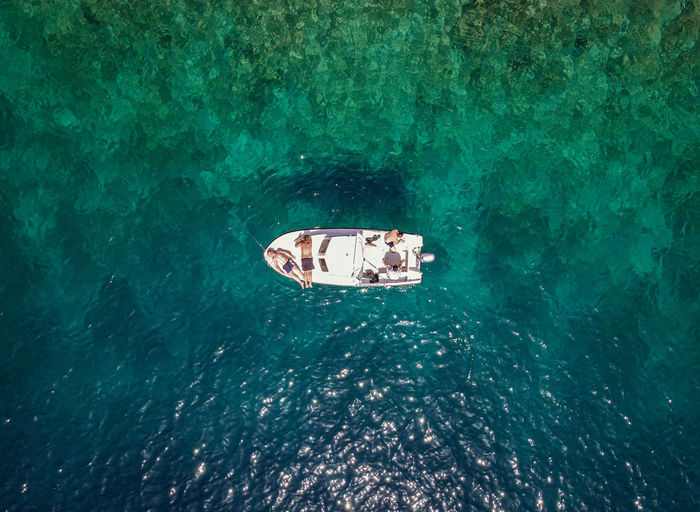 High angle view of people in sea