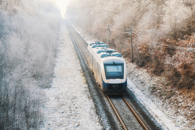 High angle view of train on railroad tracks during winter