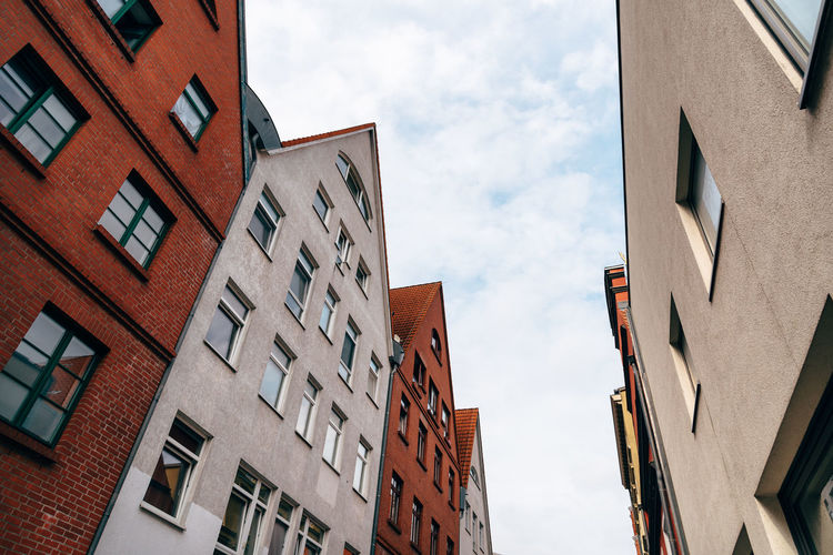 View of buildings in city against sky