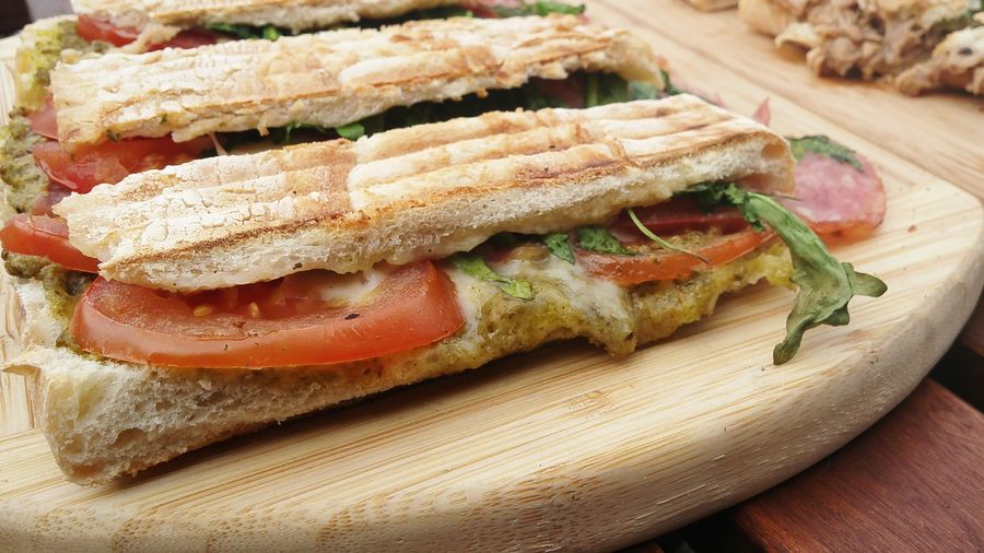 Close-up of sandwiched on cutting board