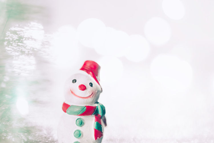 Close-up of stuffed toy on snow