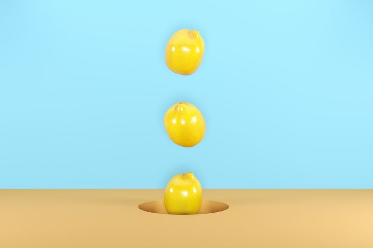 Digital composite image of watermelon over colored background