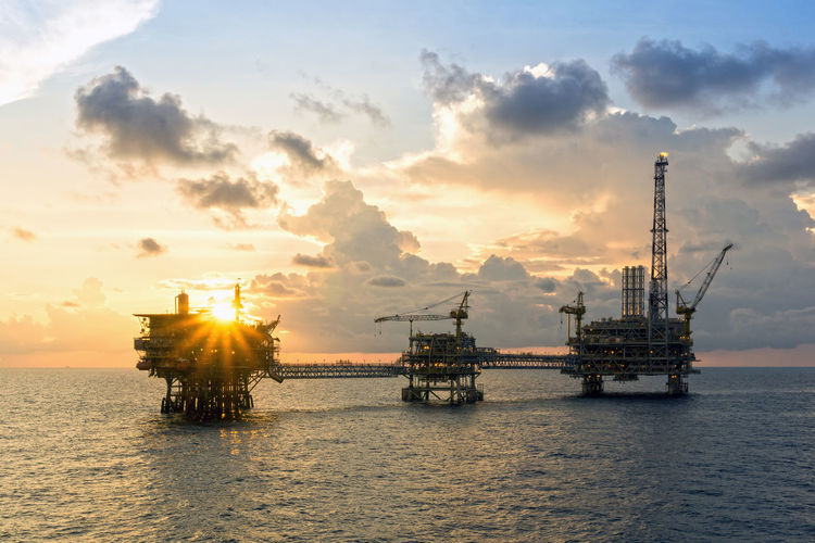 Seascape of oil production platform during golden hour at offshore terengganu oil field