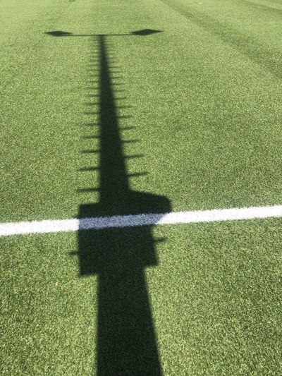 High angle view of shadow on soccer field