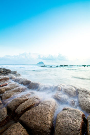 Sea water flowing through rocks