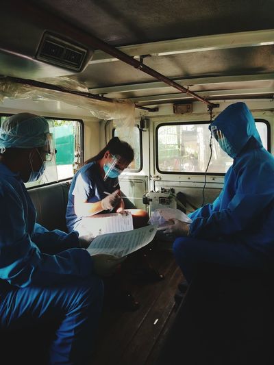 People working in bus