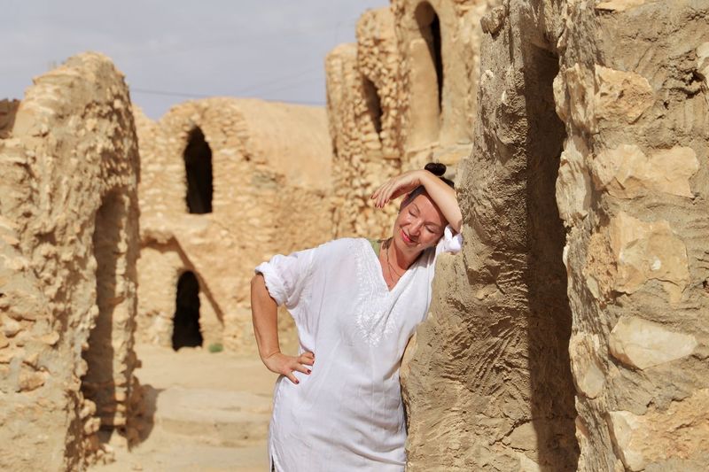 Young woman in desert ruins